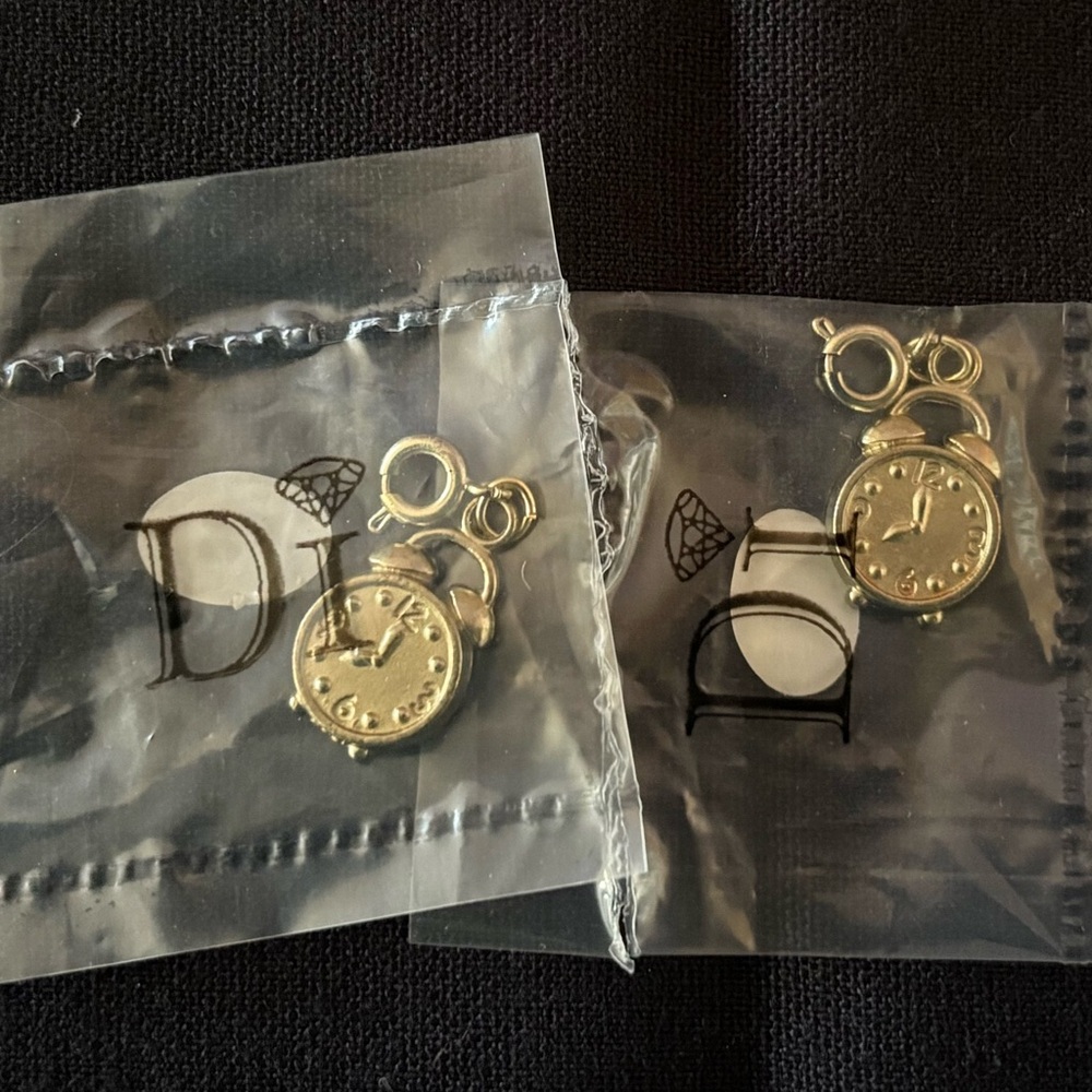 Diamond International Gold Charm Bracelet Set. 8 bracelets multiple charms. - Picture 5 of 15